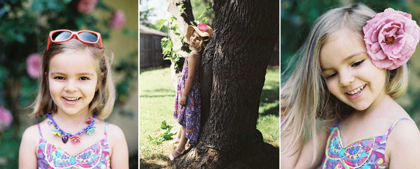 Dallas photographer photographs girl playing outside with roses in her hair.