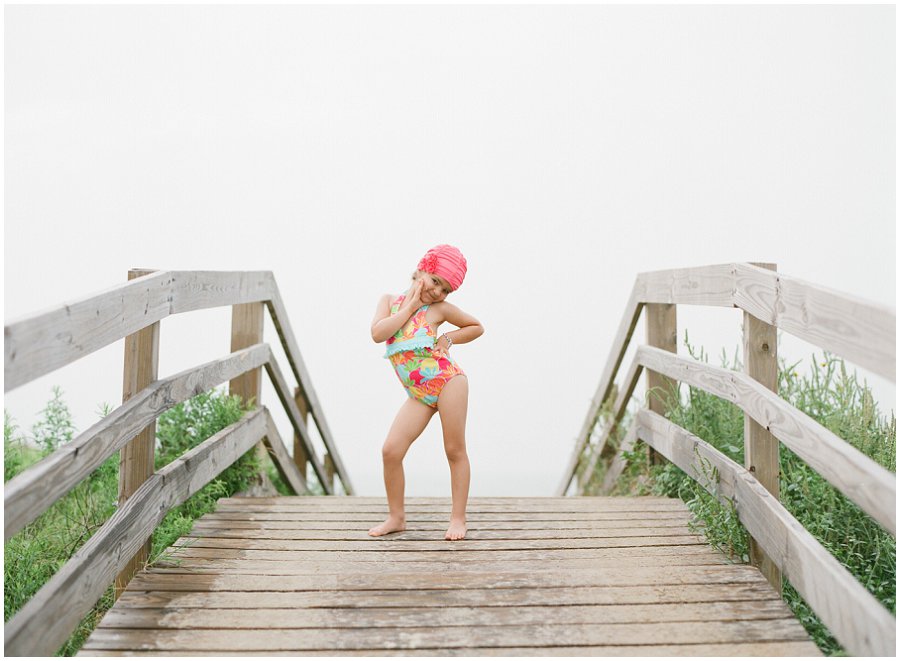 Pink Jaynie and Jack swim cap at the beach.
