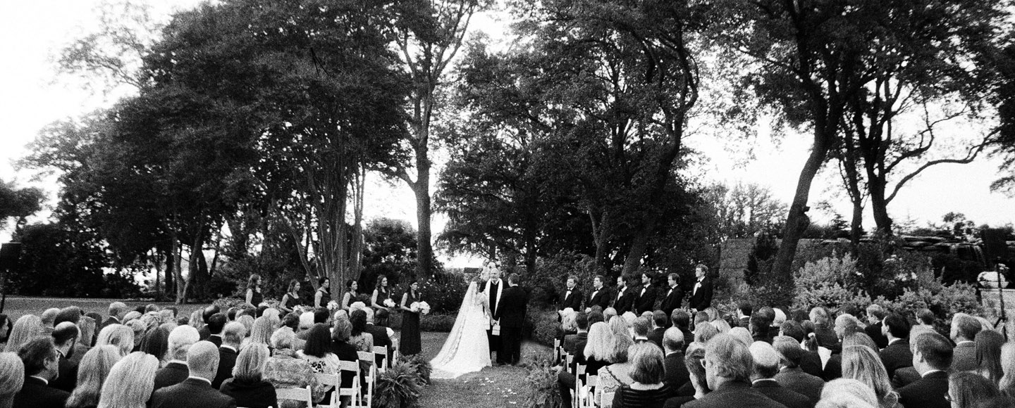 Bride and groom at Dallas arboretum ceremony by Jenny McCann.